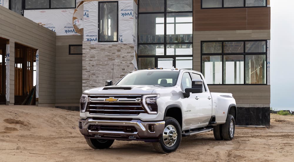A white 2025 Chevy Silverado 3500 HD LTZ is shown from the front at an angle.