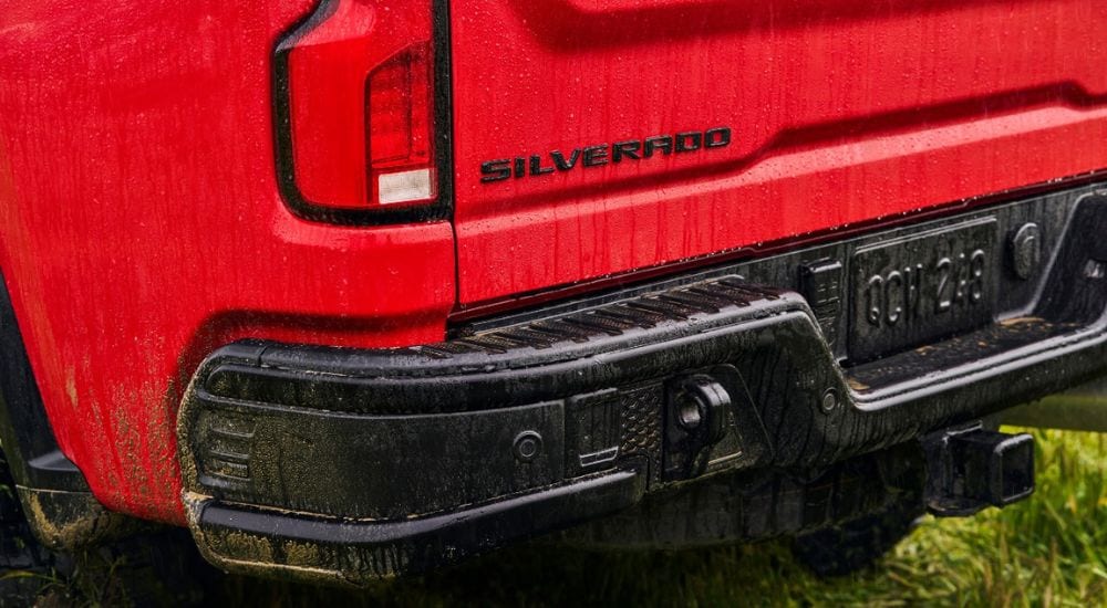 A close up shows rear end of a red 2024 Chevy Silverado 2500HD ZR2 Bison.