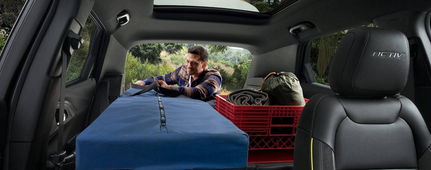 The black rear cargo interior is shown in a 2025 Chevy Trailblazer ACTIV.
