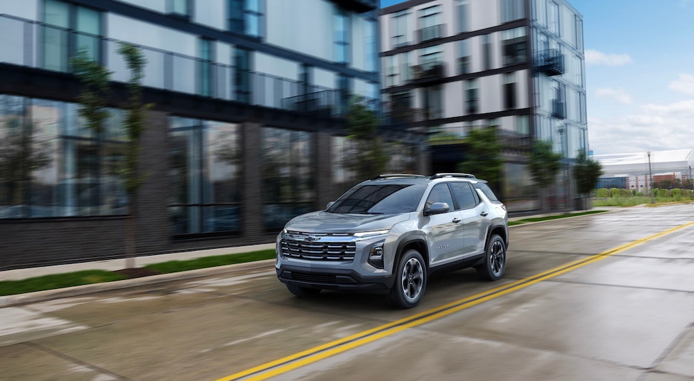 A silver 2025 Chevy Equinox LT is shownn from the front at an angle.