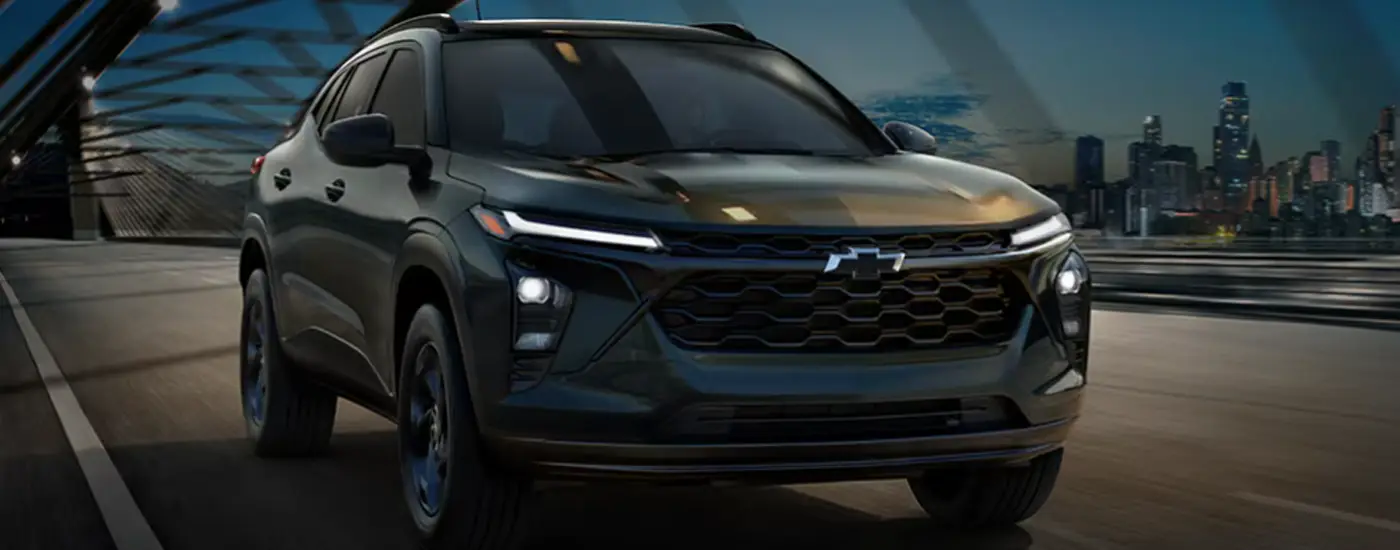 2026 Chevy Trax Driving down the road at night