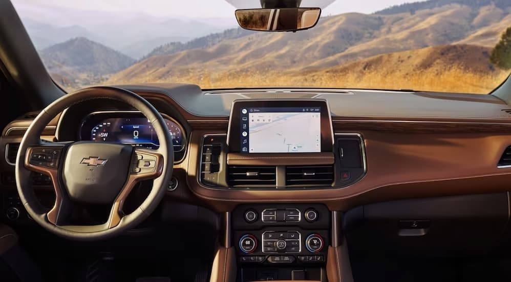  The brown interior and dash in a 2024 Chevy Suburban is shown.