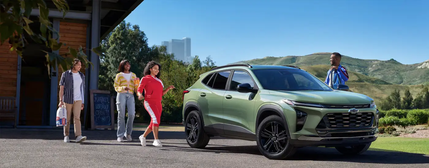 2026 Chevy Trax friend all happy on their way to drive