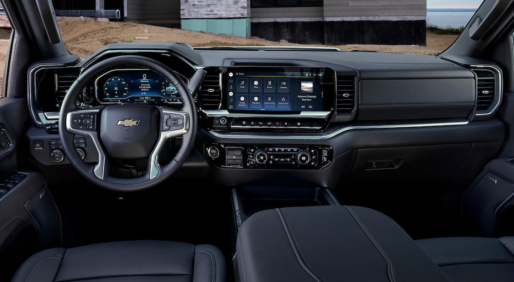 A black 2025 Chevy Silverado 3500 HD LTZ is shown from the driver's seat.
