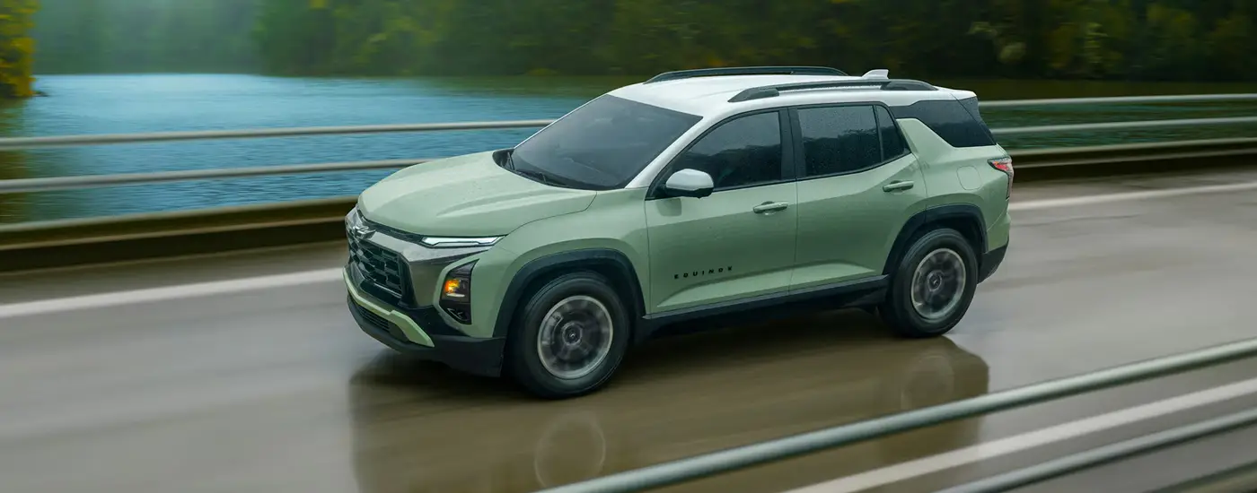 2026 Chevy Equinox Driving FAst down the road - buy one today at Dave Gill Chevy