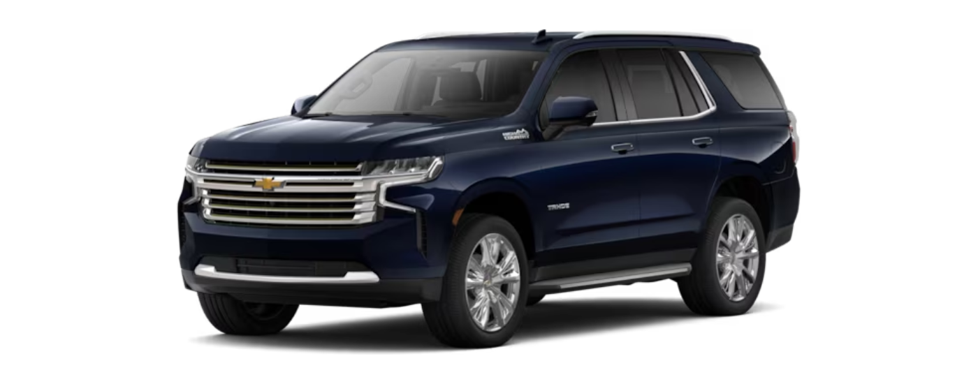 A blue 2024 Chevy Tahoe High Country is shown angled left.