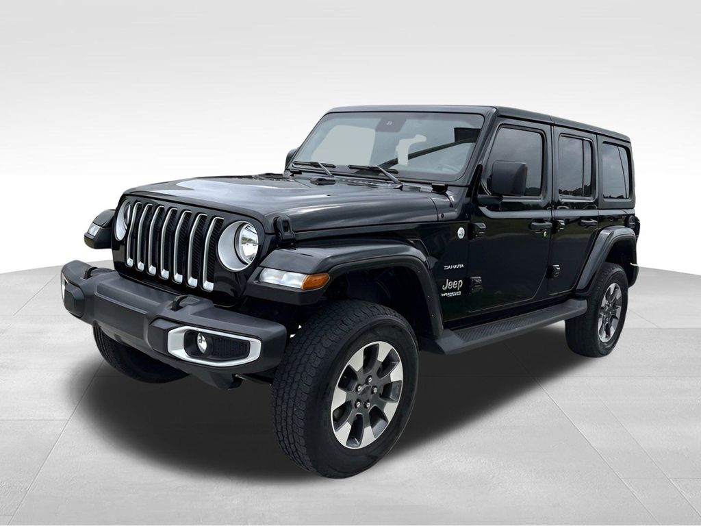 Used 2022 Jeep Wrangler Unlimited Sahara with VIN 1C4HJXENXNW127419 for sale in Adrian, MI