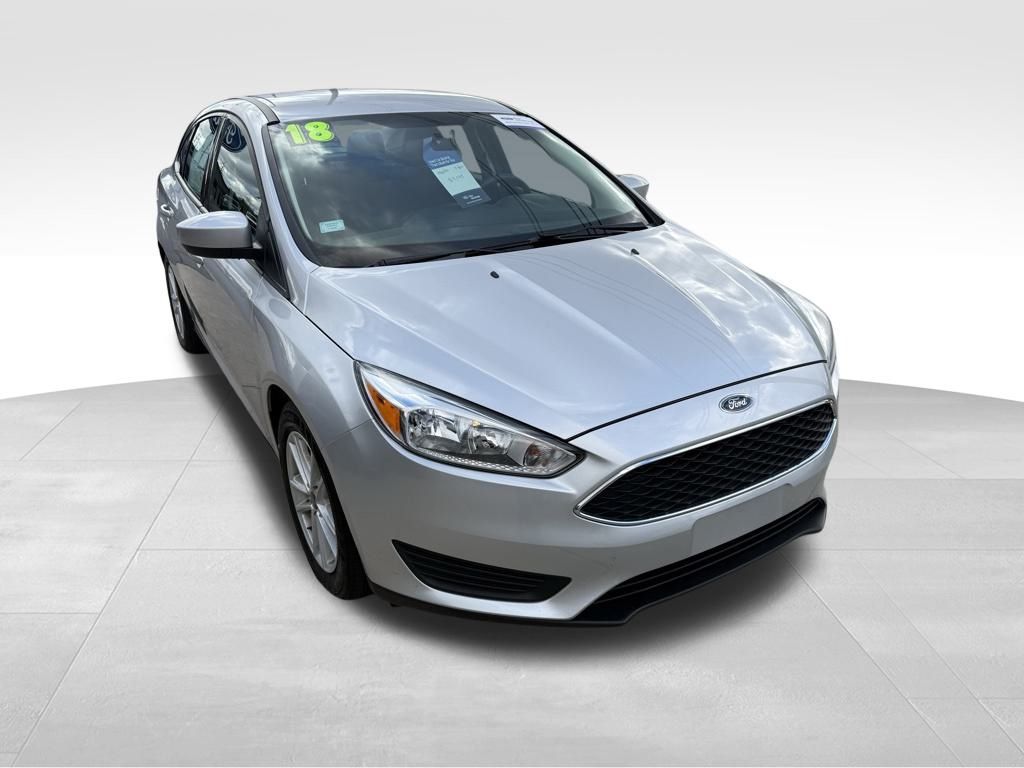 Used 2018 Ford Focus SE with VIN 1FADP3F29JL239852 for sale in Adrian, MI