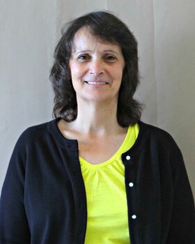 Staff member Stacey Stone from ID_58aaee40692c