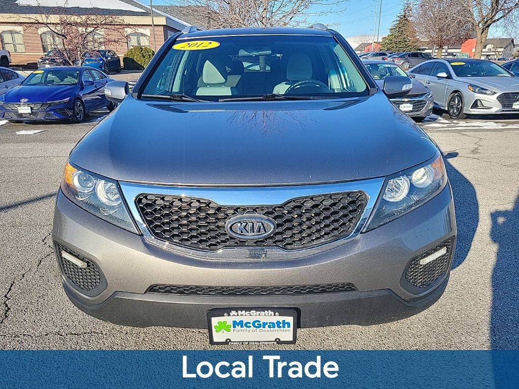 Used 2012 Kia Sorento LX with VIN 5XYKTDA21CG259425 for sale in Hiawatha, IA