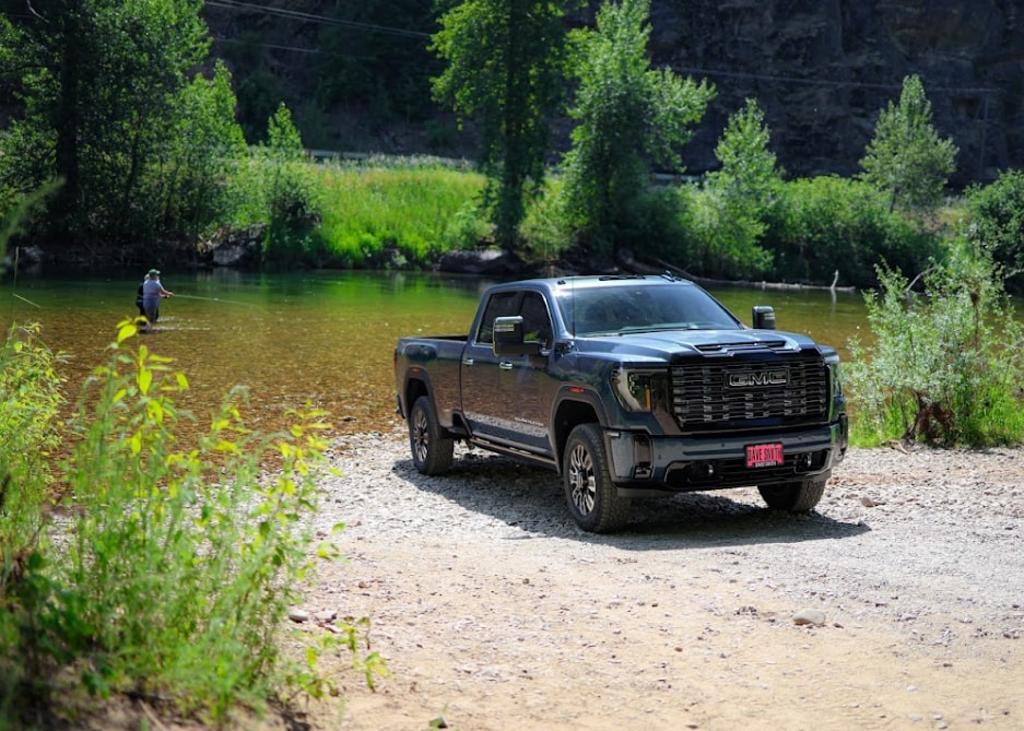 GMC truck owner with a customized pickup in winter weather