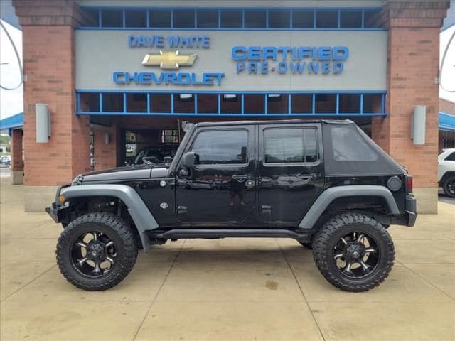 Used 2013 Jeep Wrangler Unlimited Sport with VIN 1C4BJWDG1DL677272 for sale in Sylvania, OH