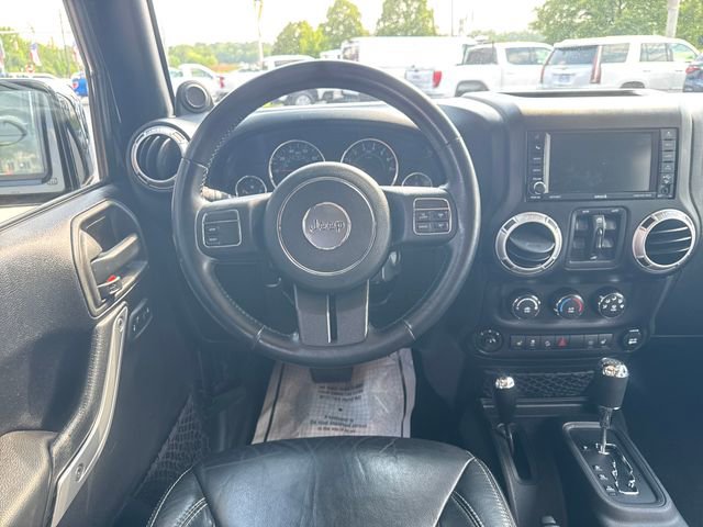 Used 2014 Jeep Wrangler Unlimited Sahara with VIN 1C4BJWEG0EL296450 for sale in Sylvania, OH