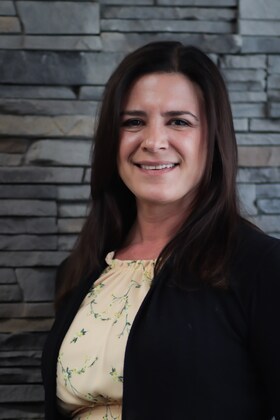 Staff member Mindy from 54c1c5c4d675