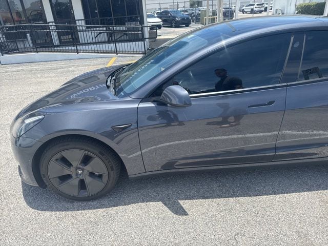 Used 2022 Tesla Model 3 Base with VIN 5YJ3E1EA3NF371247 for sale in Orlando, FL