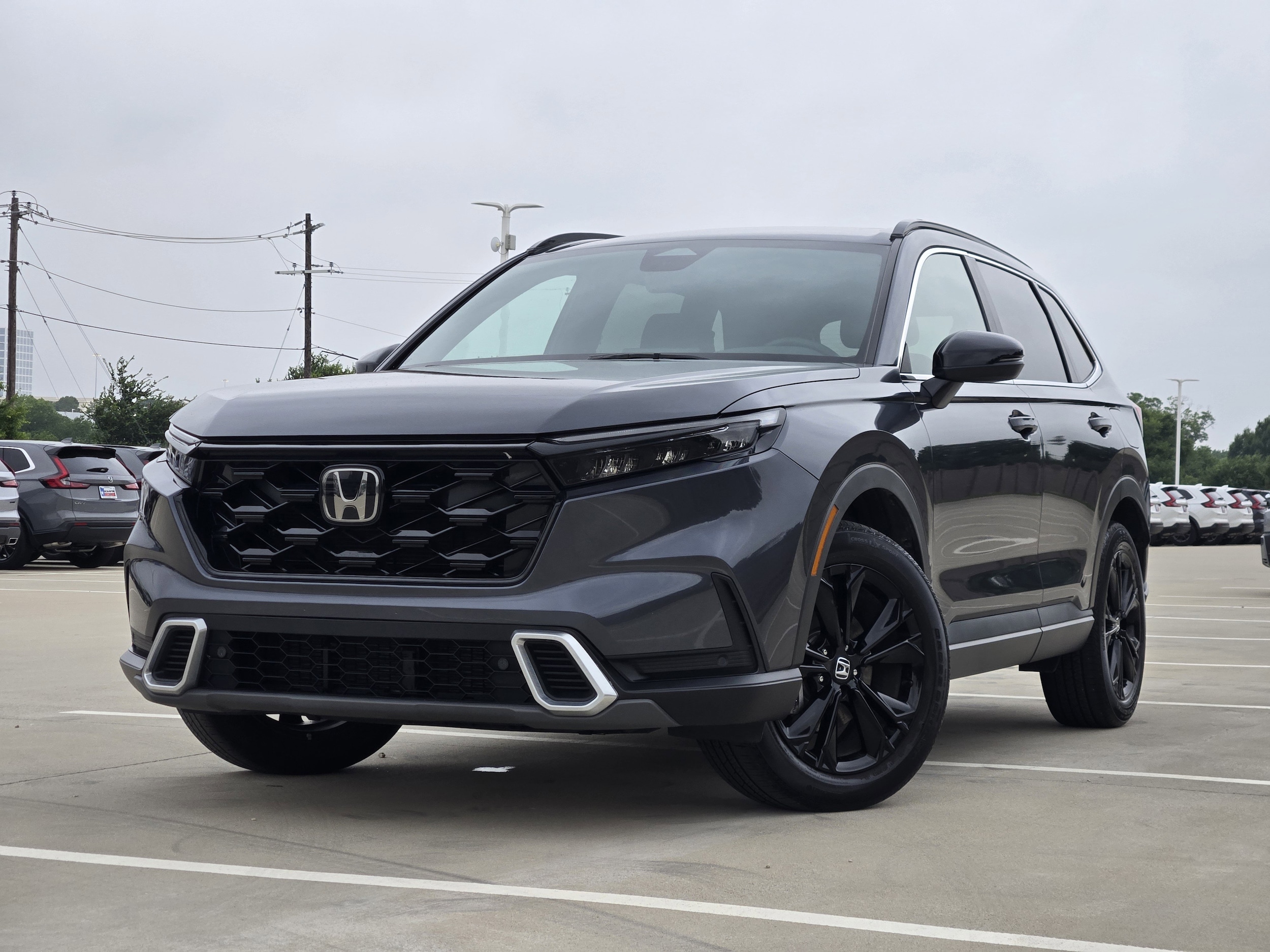 2024 Honda CR-V Hybrid Sport Touring AWD's photo