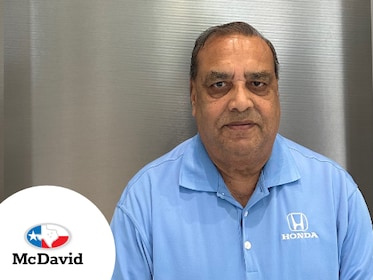 Staff member Haji Khalid from ID_8c05c1
