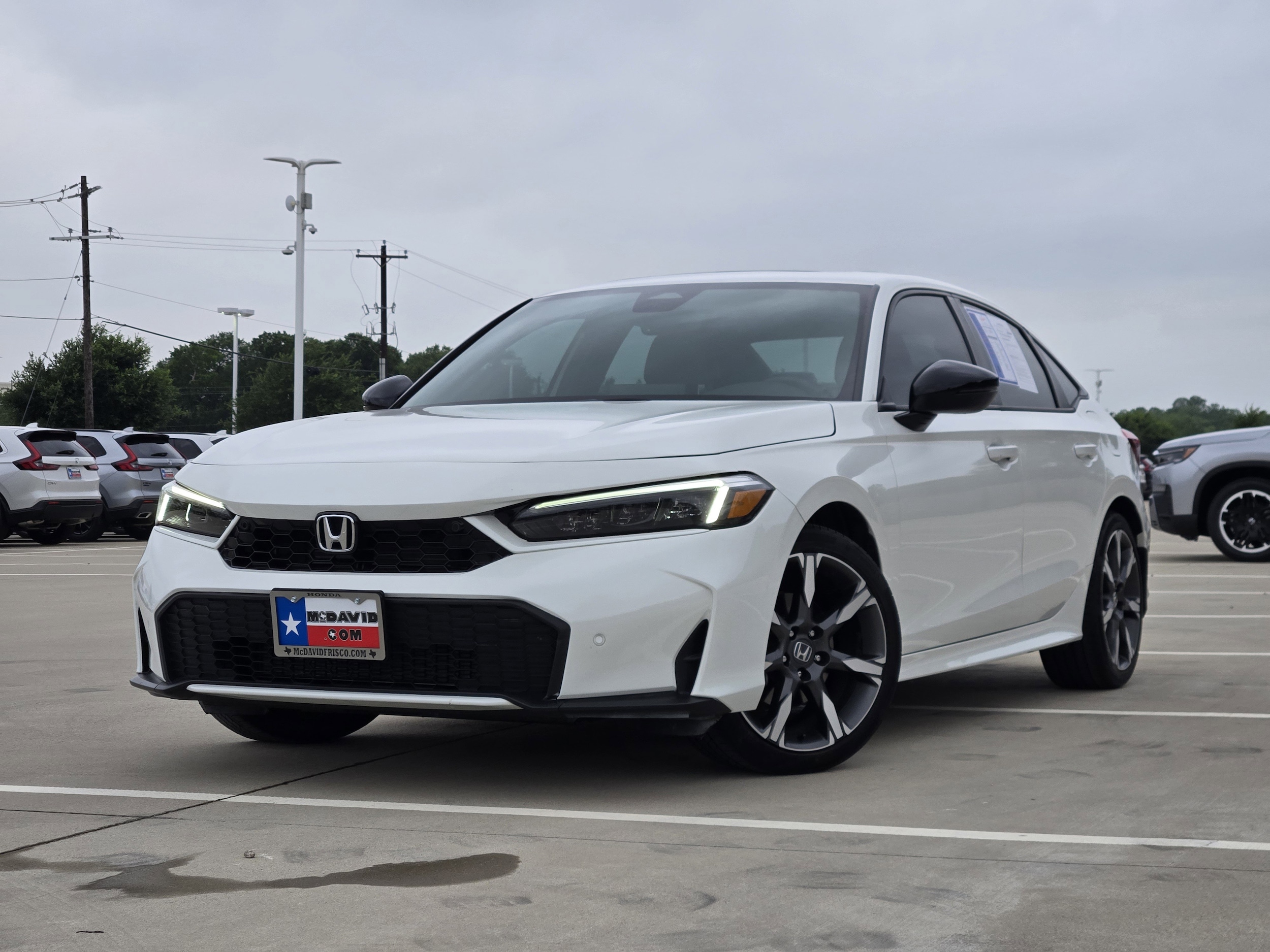 2025 Honda Civic Sport Touring Hybrid CVT's photo
