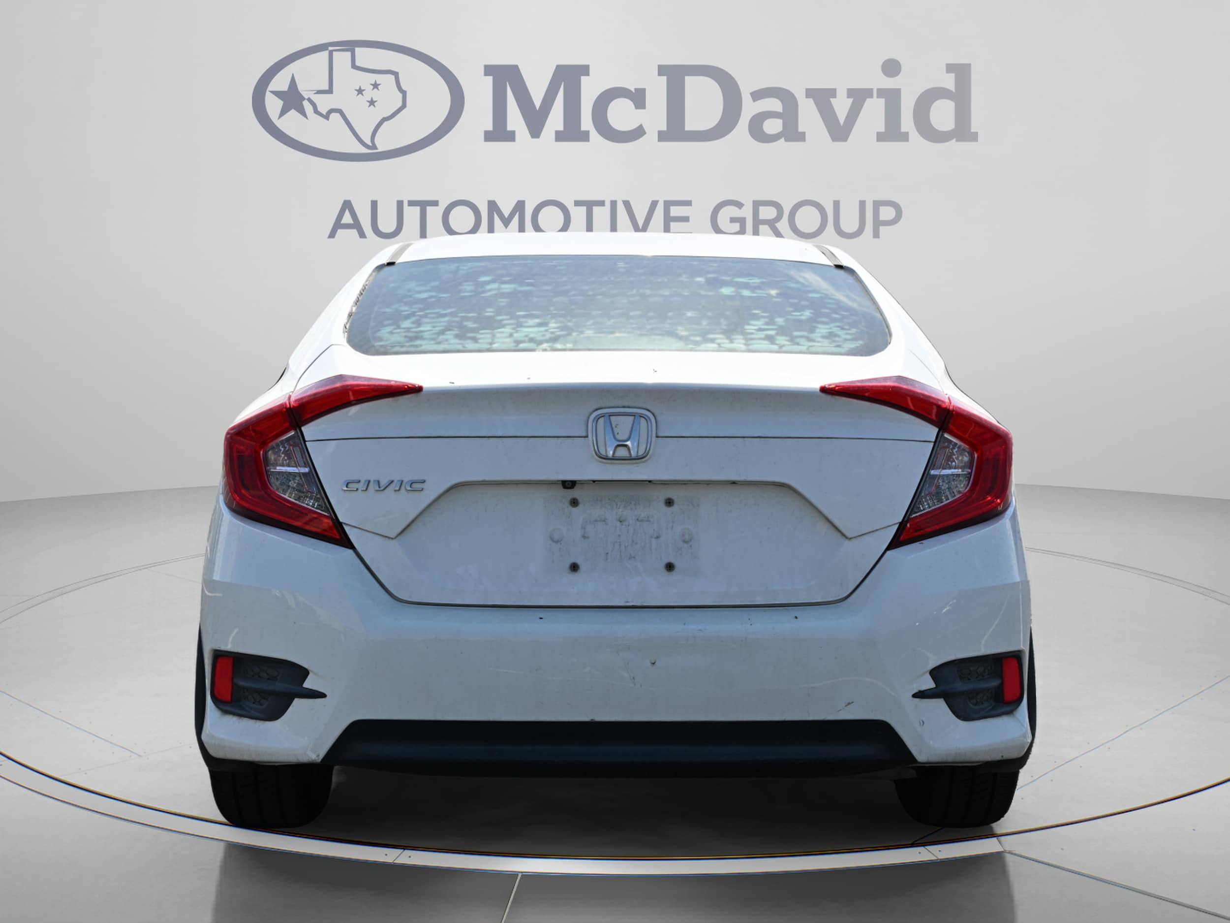 Used 2018 Honda Civic LX with VIN 19XFC2F59JE004556 for sale in Irving, TX