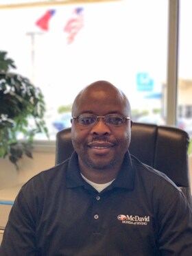 Staff member Felix Ndingwan from ID_3235045ac4b0