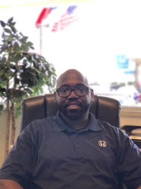 Staff member Godfrey Fergus from ID_3235045ac4b0