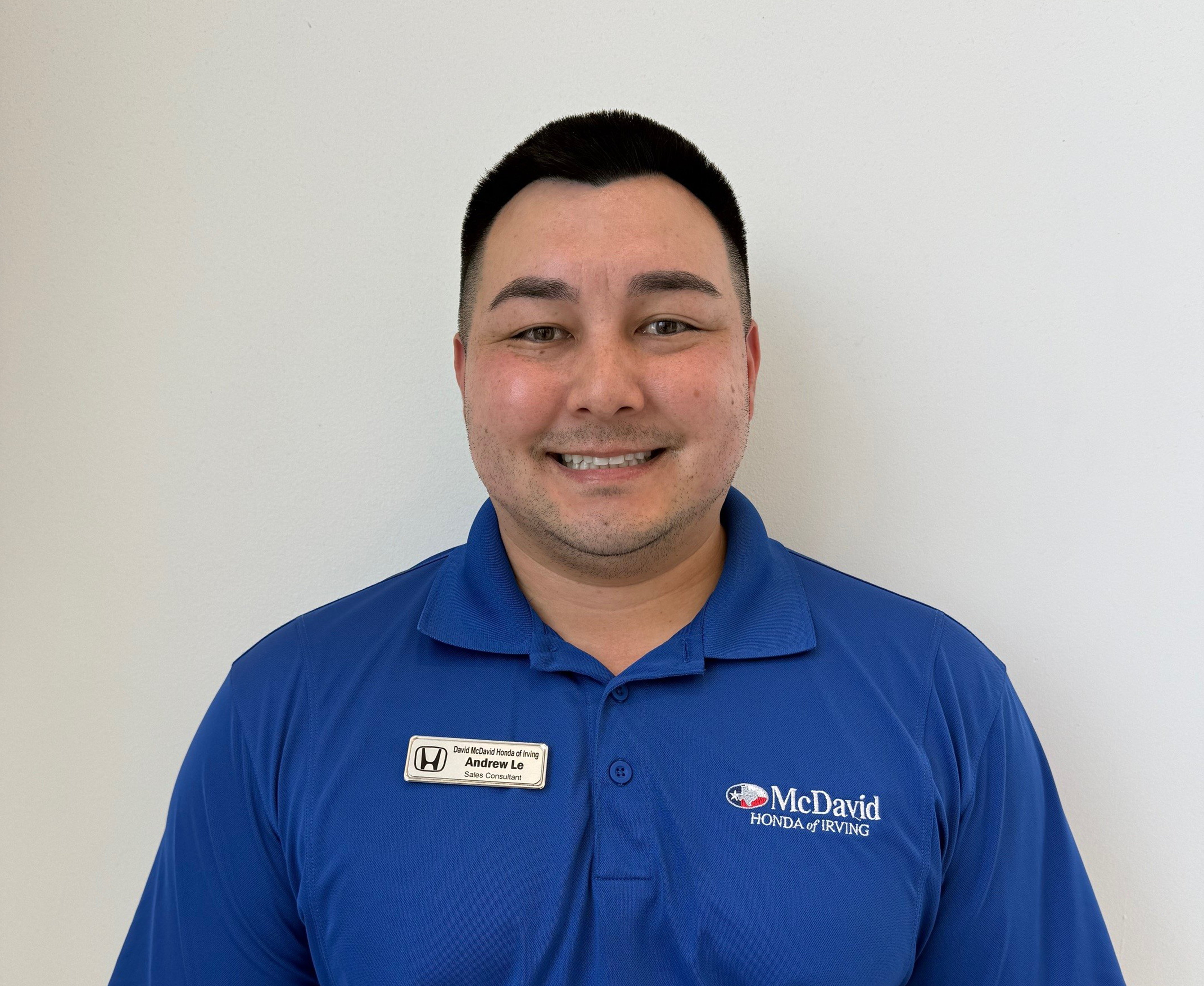 Staff member Andrew Le from ID_c0f1f2