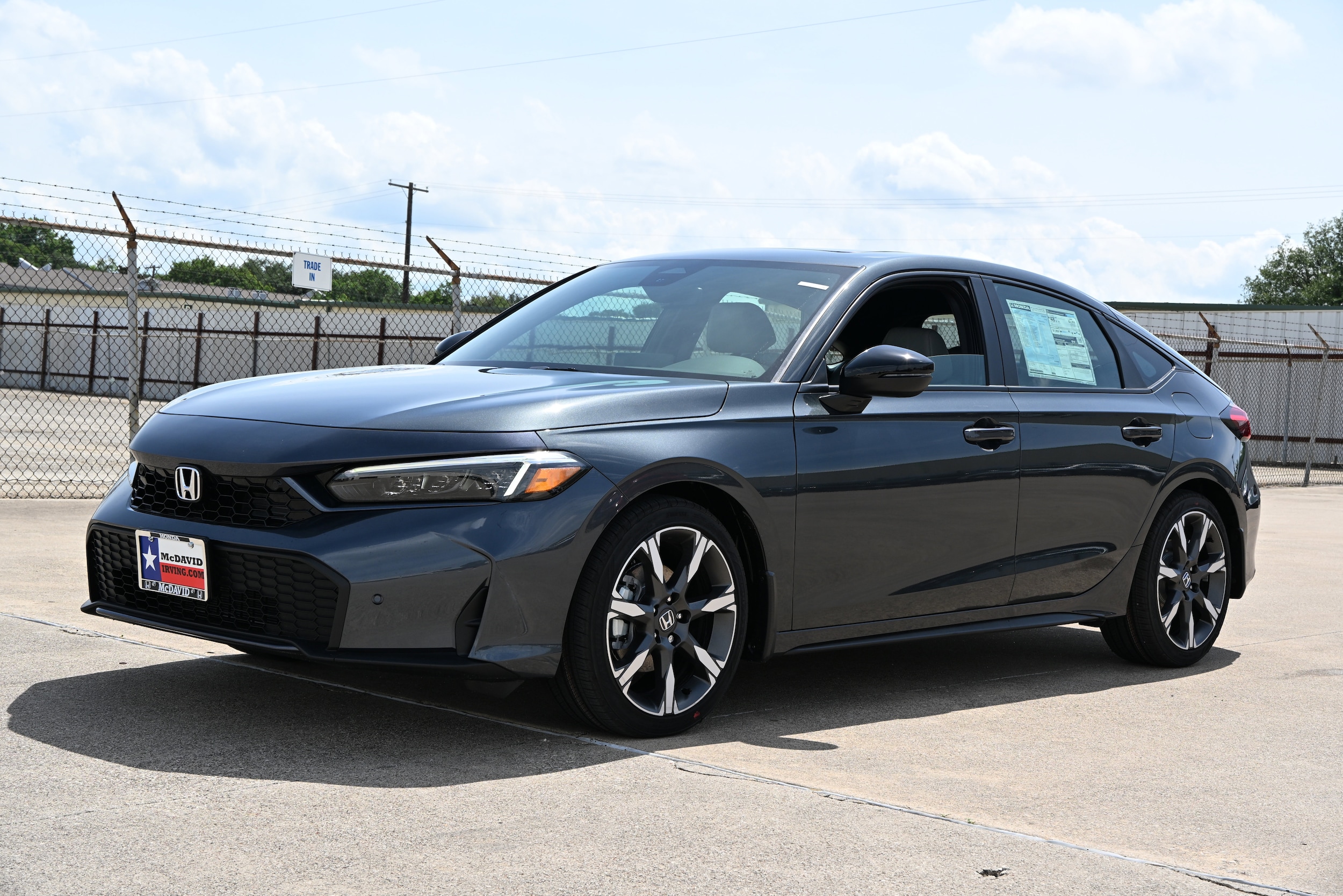 2026 Honda Civic Sport Touring Hybrid CVT's photo