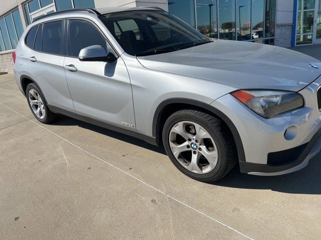 Used 2015 BMW X1 28i with VIN WBAVM1C53FV315679 for sale in Irving, TX