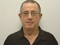 Staff member Edward Gusa from ID_d8d64e48e19e