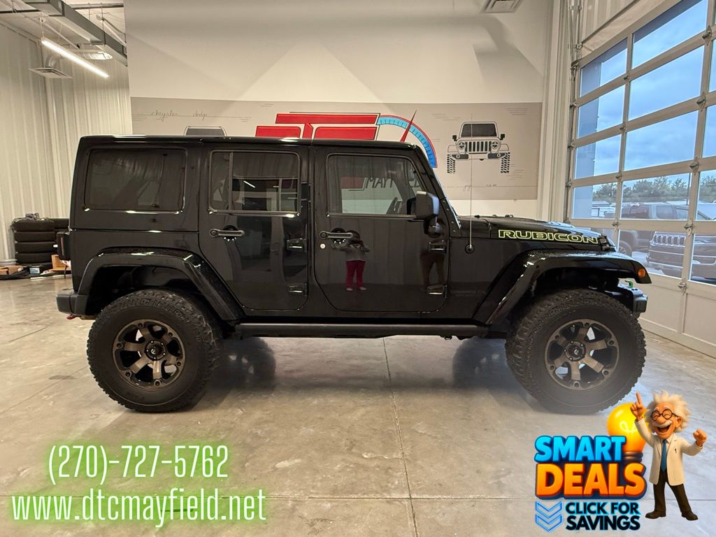 Used 2015 Jeep Wrangler Unlimited Rubicon with VIN 1C4BJWFG1FL627021 for sale in Mayfield, KY