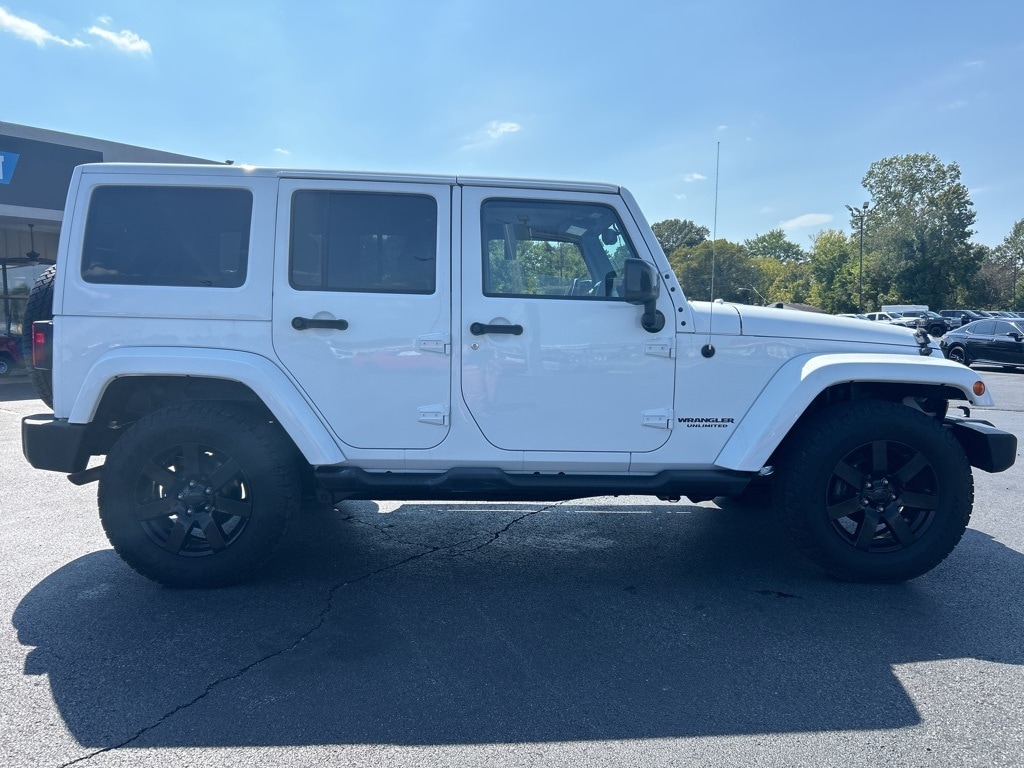 Used 2014 Jeep Wrangler Unlimited Sahara with VIN 1C4BJWEG4EL318093 for sale in Benton, KY