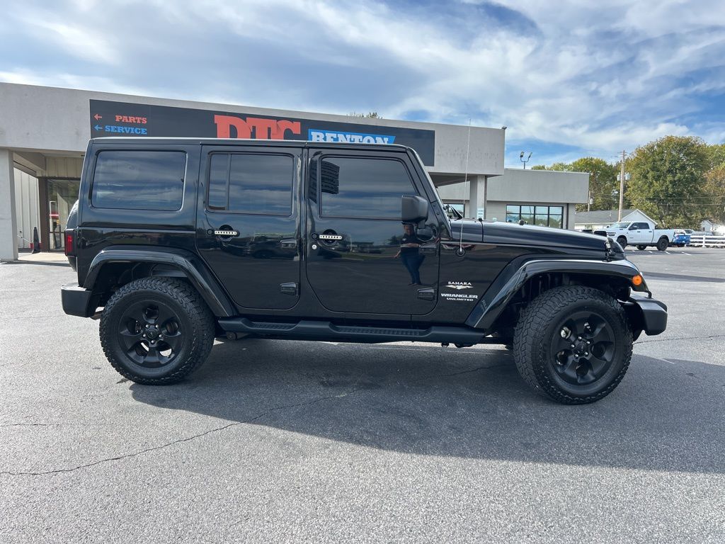 Used 2015 Jeep Wrangler Unlimited Sahara with VIN 1C4BJWEG7FL571216 for sale in Benton, KY