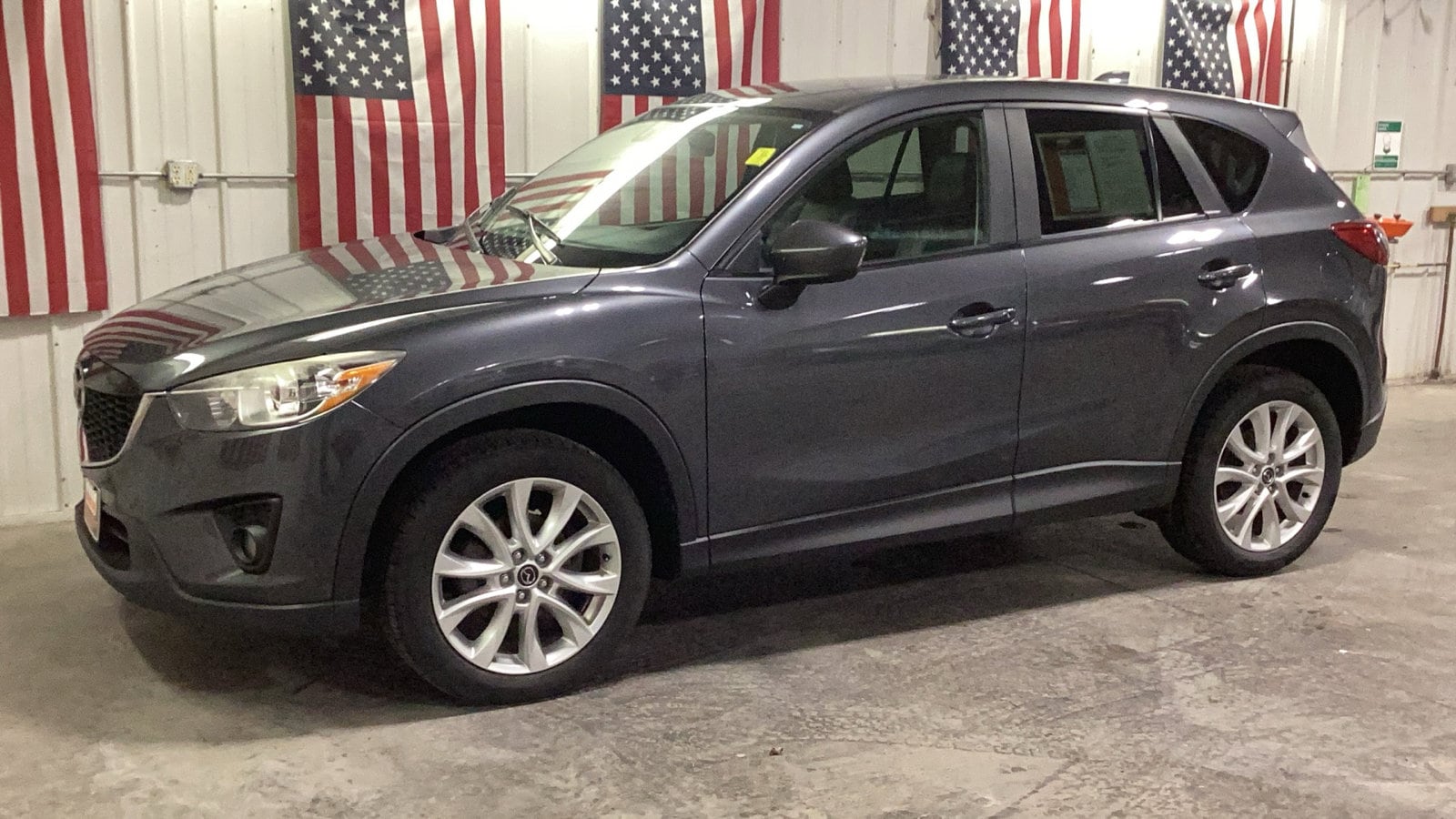 Used 2014 Mazda CX-5 Grand Touring with VIN JM3KE4DY7E0318942 for sale in Delano, Minnesota