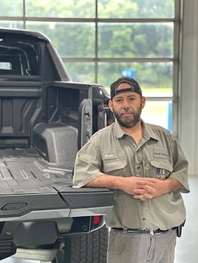 Staff member Kevin Mende from ID_821363