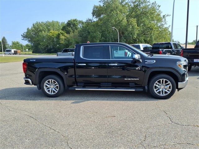 Used 2021 GMC Sierra 1500 SLT with VIN 3GTU9DEL9MG257077 for sale in Litchfield, Minnesota