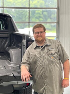 Staff member TYLER LARSEN from ID_82a9d0