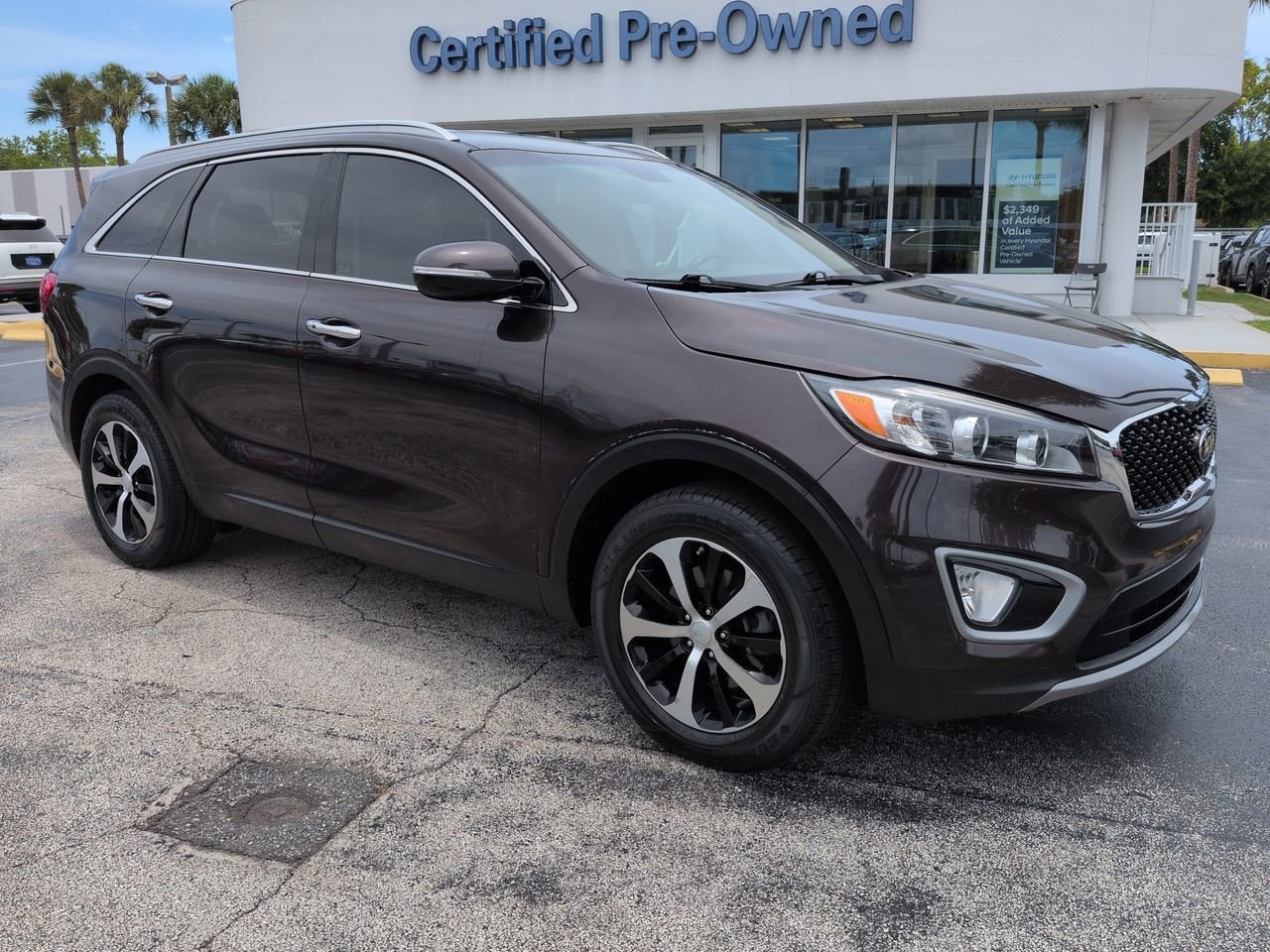 Used 2018 Kia Sorento EX with VIN 5XYPH4A14JG355903 for sale in Daytona Beach, FL