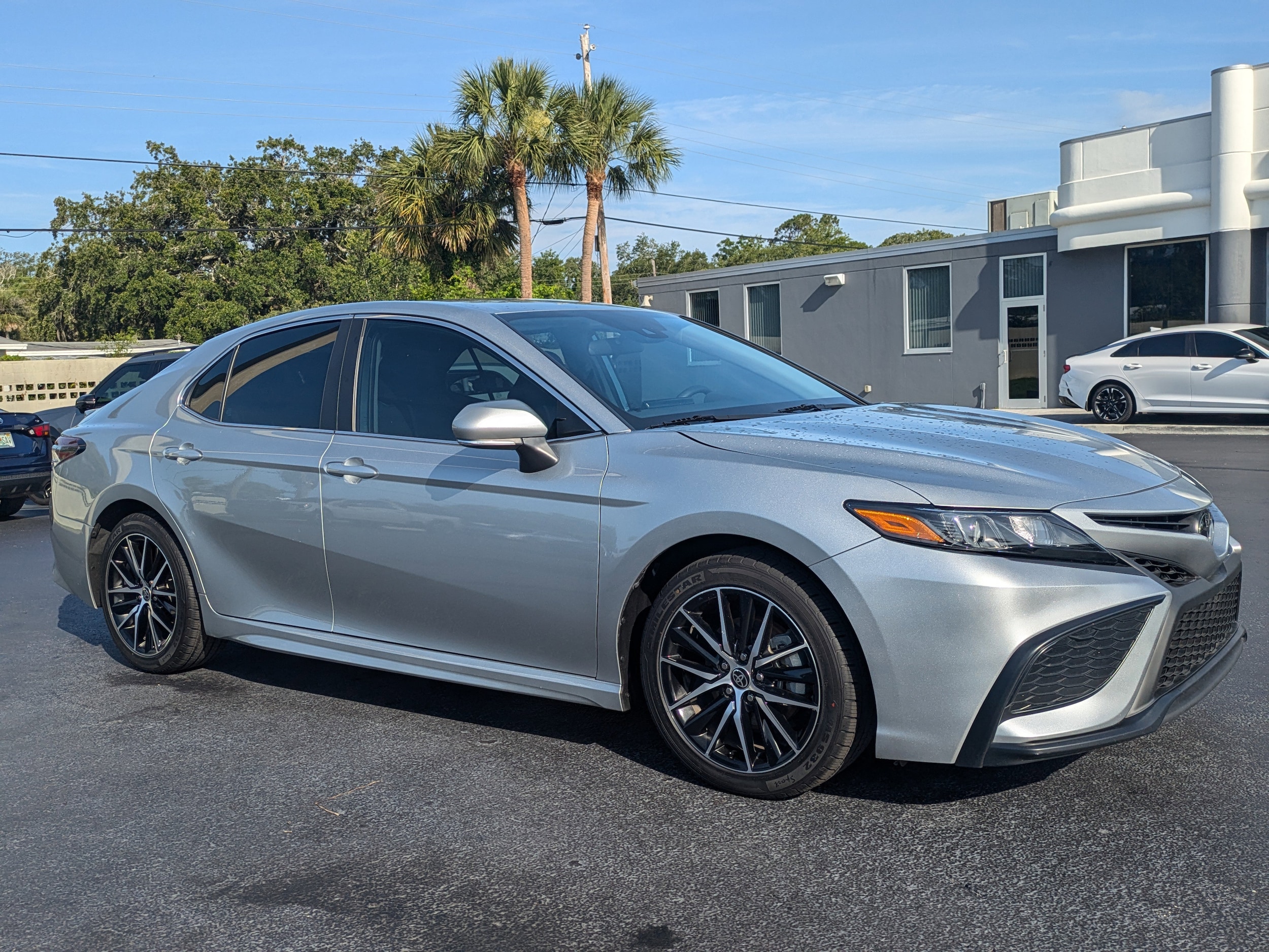 Used 2023 Toyota Camry SE with VIN 4T1G11AK4PU805385 for sale in Daytona Beach, FL