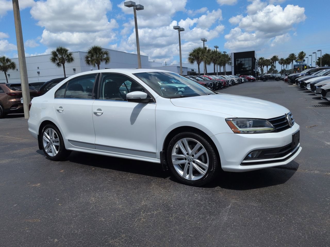Used 2017 Volkswagen Jetta SEL with VIN 3VWL17AJ5HM363586 for sale in Daytona Beach, FL