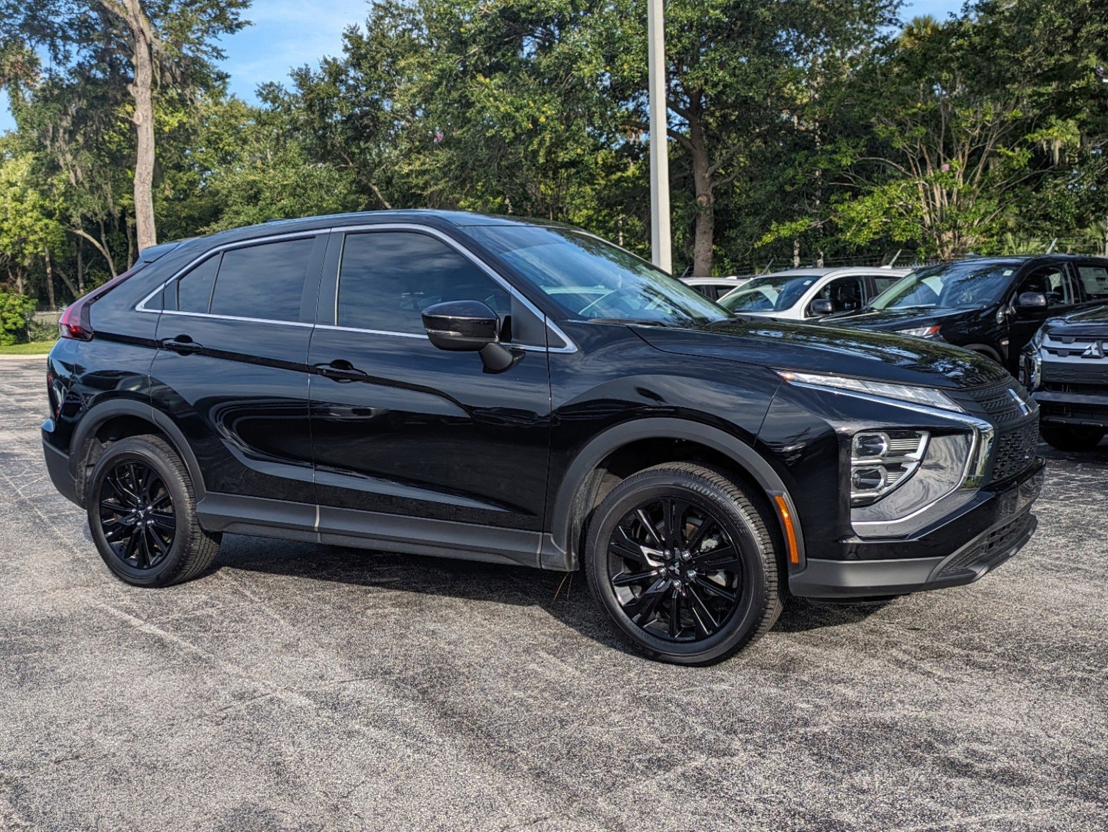 Used 2024 Mitsubishi Eclipse Cross LE with VIN JA4ATVAA4RZ001932 for sale in Daytona Beach, FL