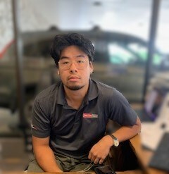 Staff member Christopher Lou from ID_8b793409dc82