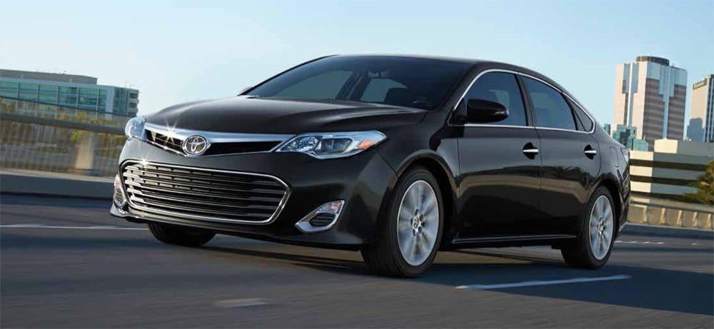 2014 Toyota Avalon and Ford Taurus exterior