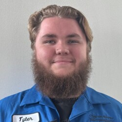 Staff member Tyler Cone from ID_9d7e5800437a