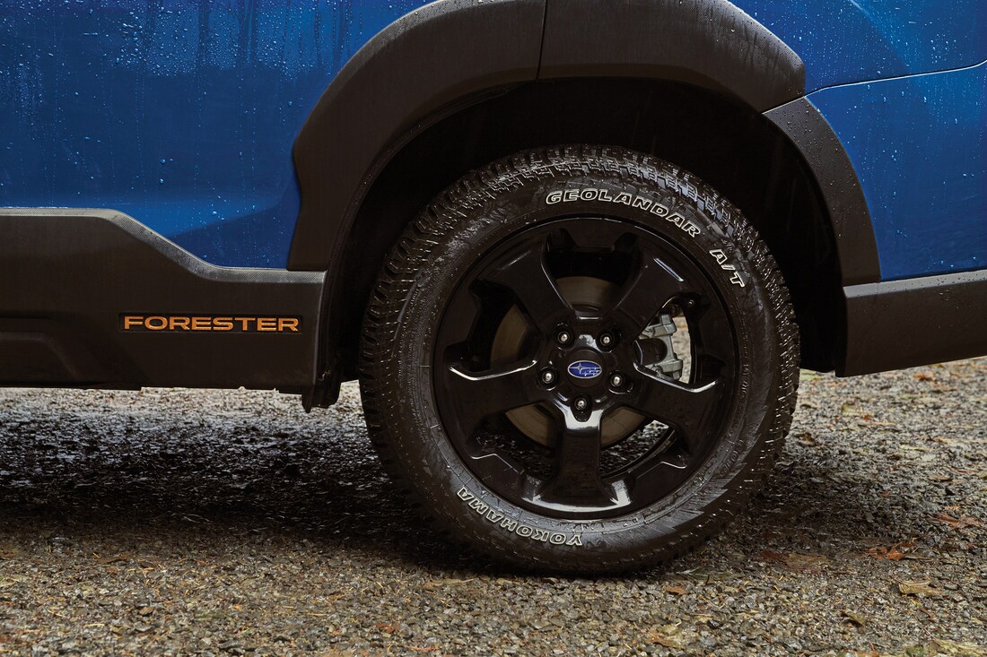 blue Subaru Forester SUV wheels