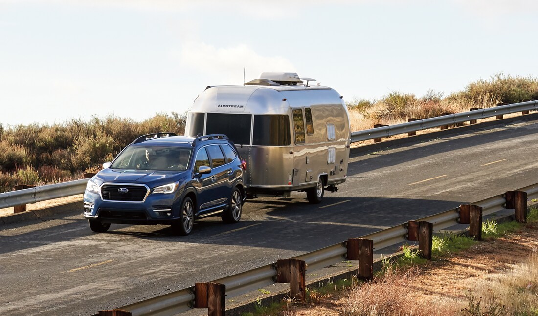 blue Subaru Ascent SUV towing an Airstream along PCH