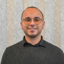 Staff member Amado Cocio from ID_18f2b2143d2f