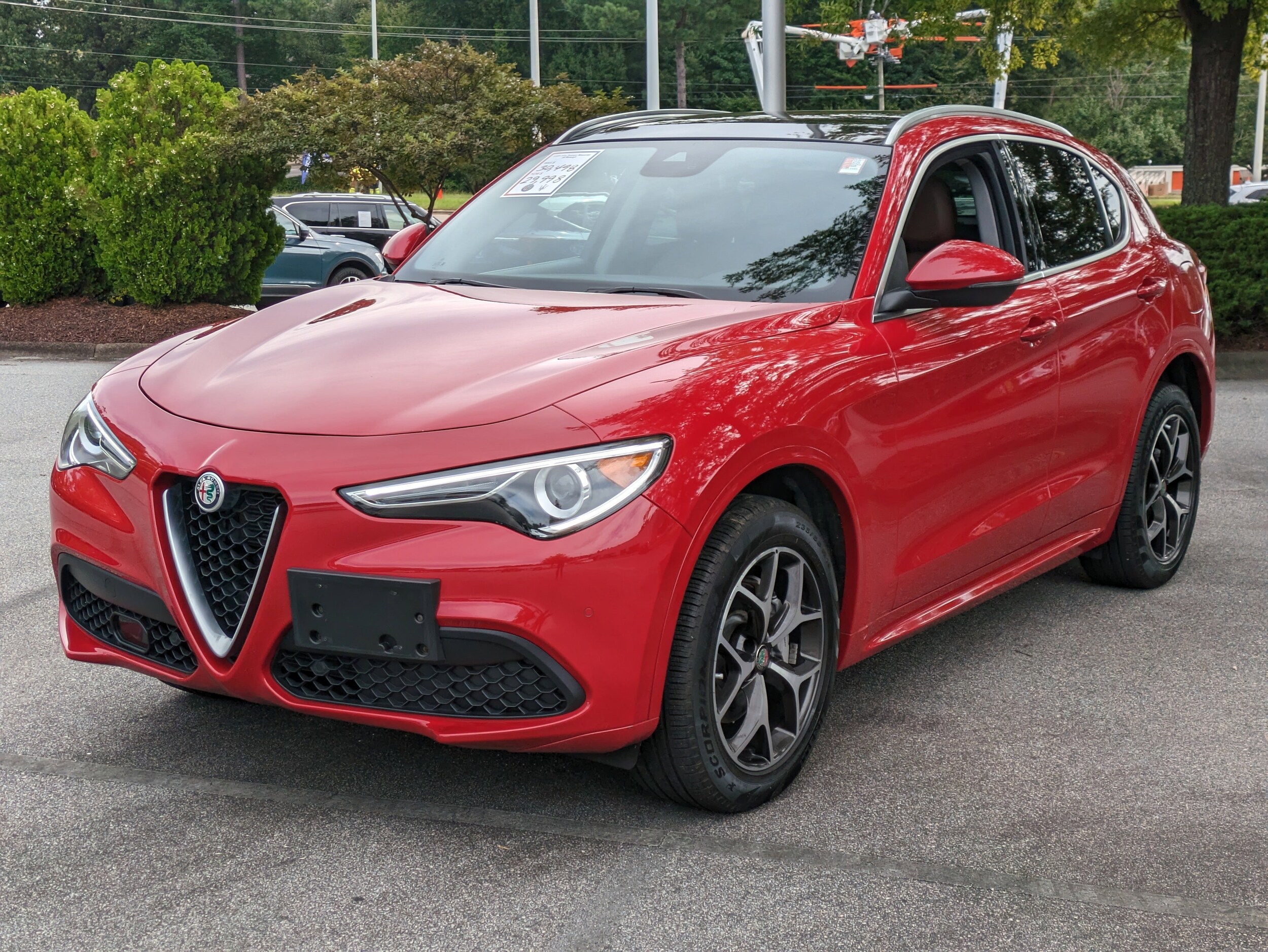 Used 2021 Alfa Romeo Stelvio Ti with VIN ZASPAKBN9M7D17599 for sale in Raleigh, NC