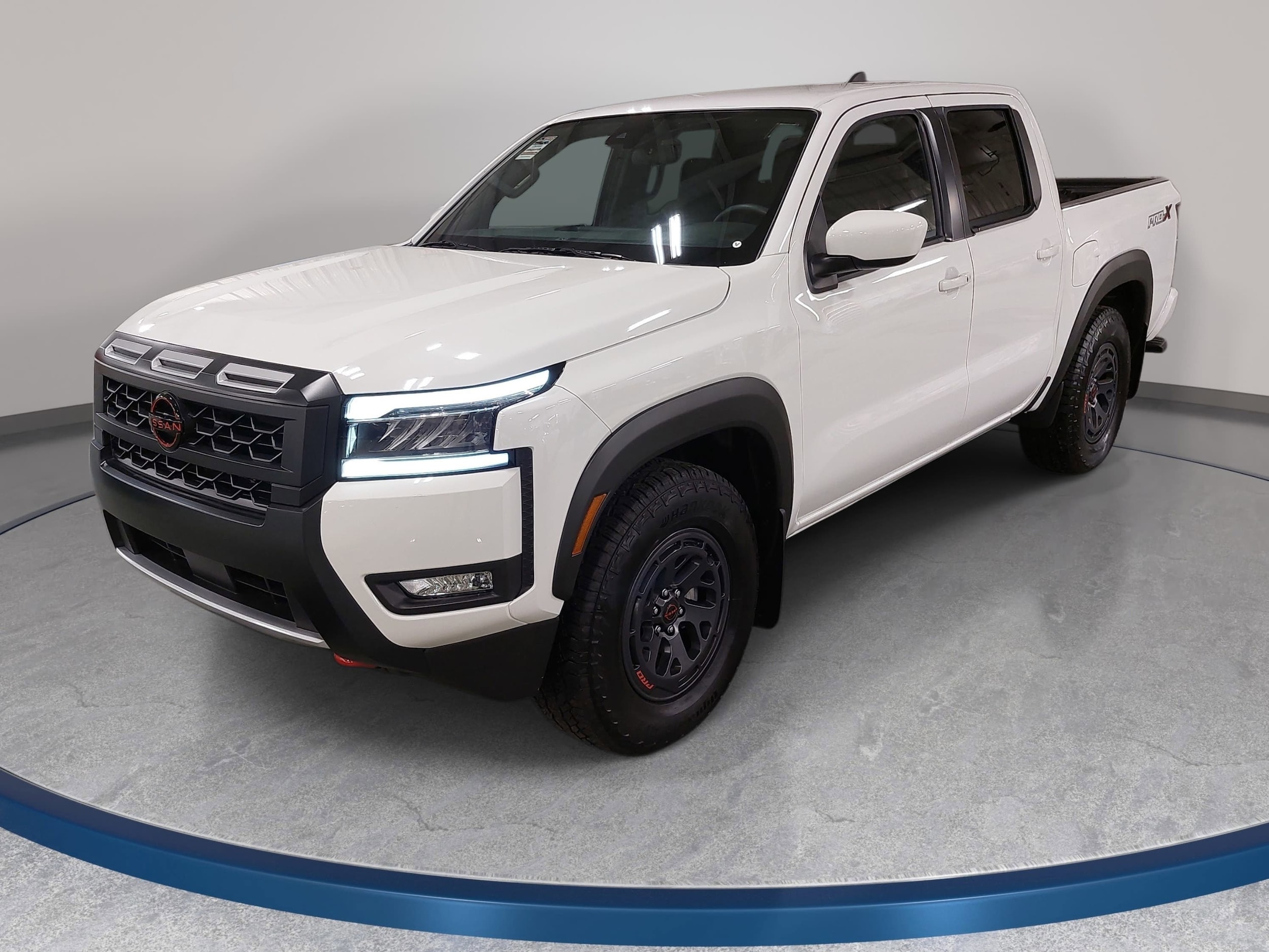 Glacier White 2025 Nissan Frontier PRO-X Crew Cab RWD Pickup Truck 4X2 Automatic