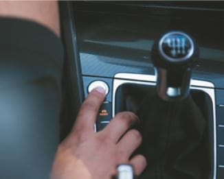 A person using Volkswagen technology feature in their vehicle