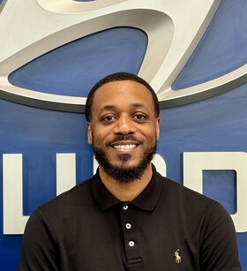 Staff member Scott Moore  from ID_3080144b6e8e